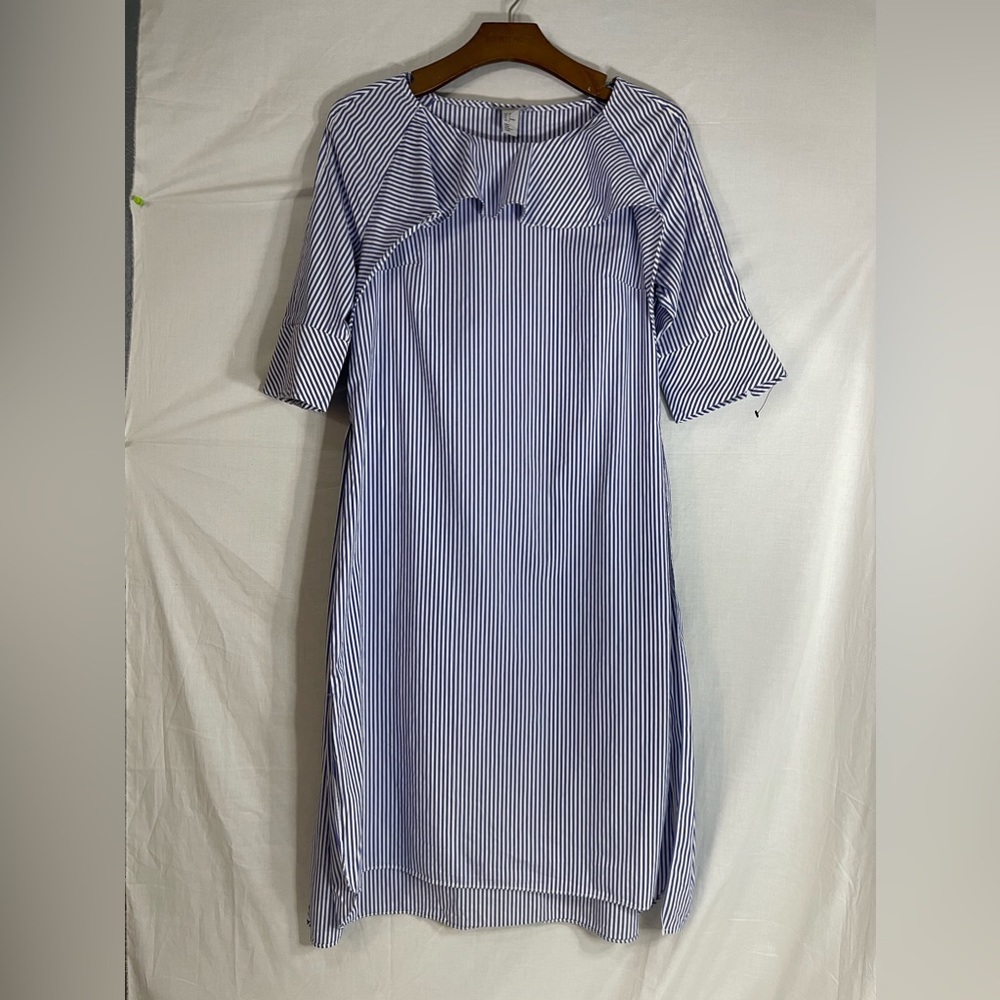 H&M dress Blume line and white size 8  not new but great conductions .
